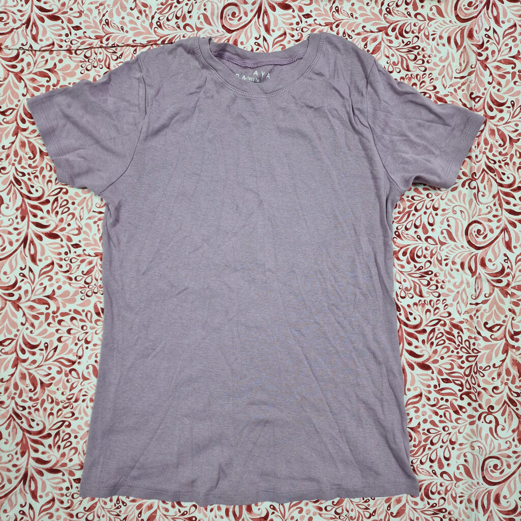 a plain t-shirt spread out flat.